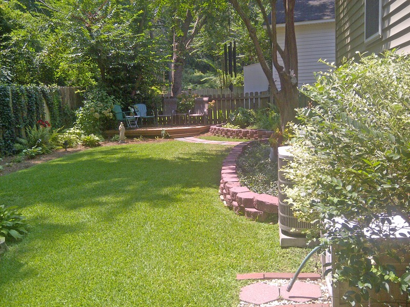 Installed Curved Brick Walkway and Water Hose Splash Area, and Moved and Planted Hostas